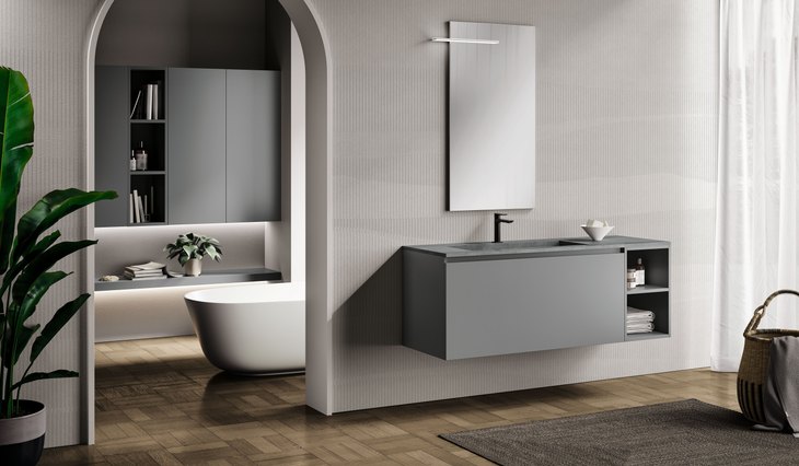 Bagno compatto con base sospesa e vasca freestanding