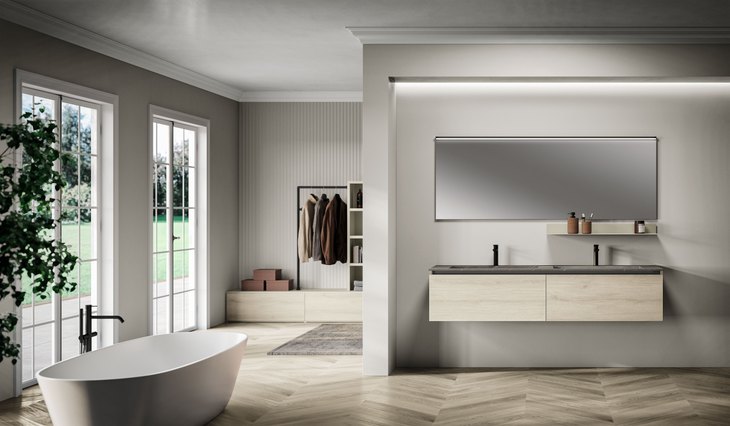 Bagno con doppia vasca integrata e angolo spogliatoio