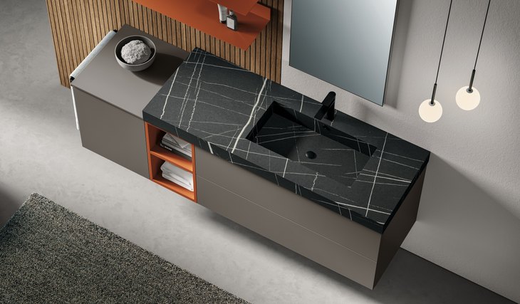 Lavabo integrato nel top in marmo nero